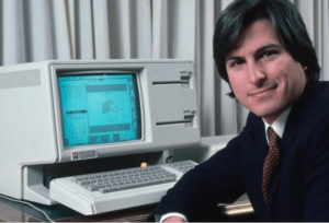 Apple co-founder Steve Jobs pictured with the groundbreaking Apple Lisa